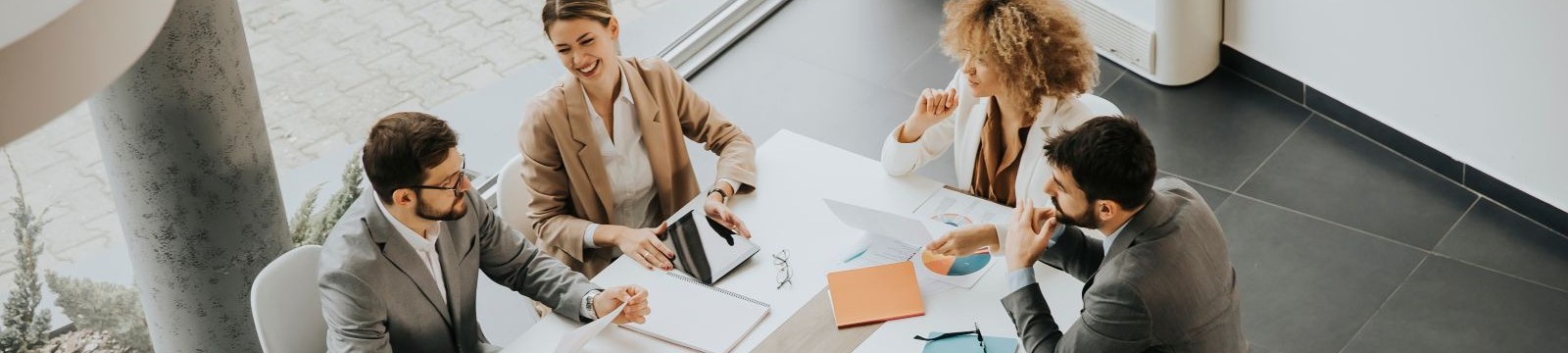 4 professionals having a meeting